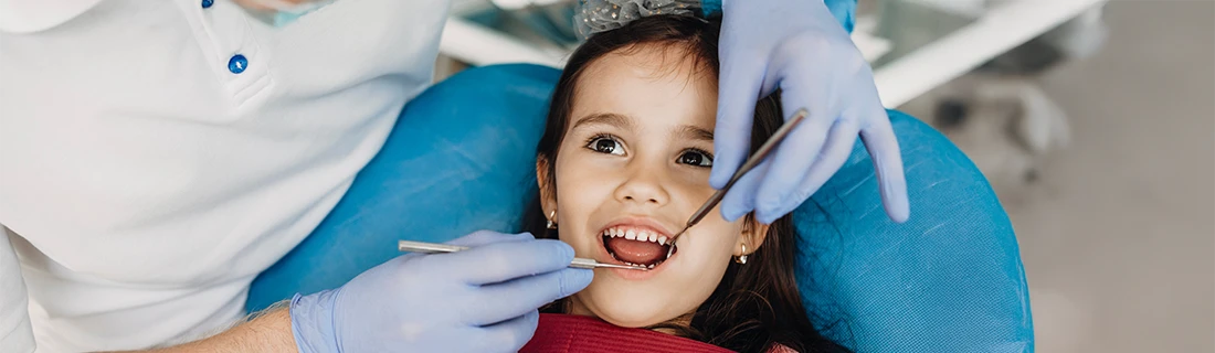 Little Girl Receiving Dental Exam